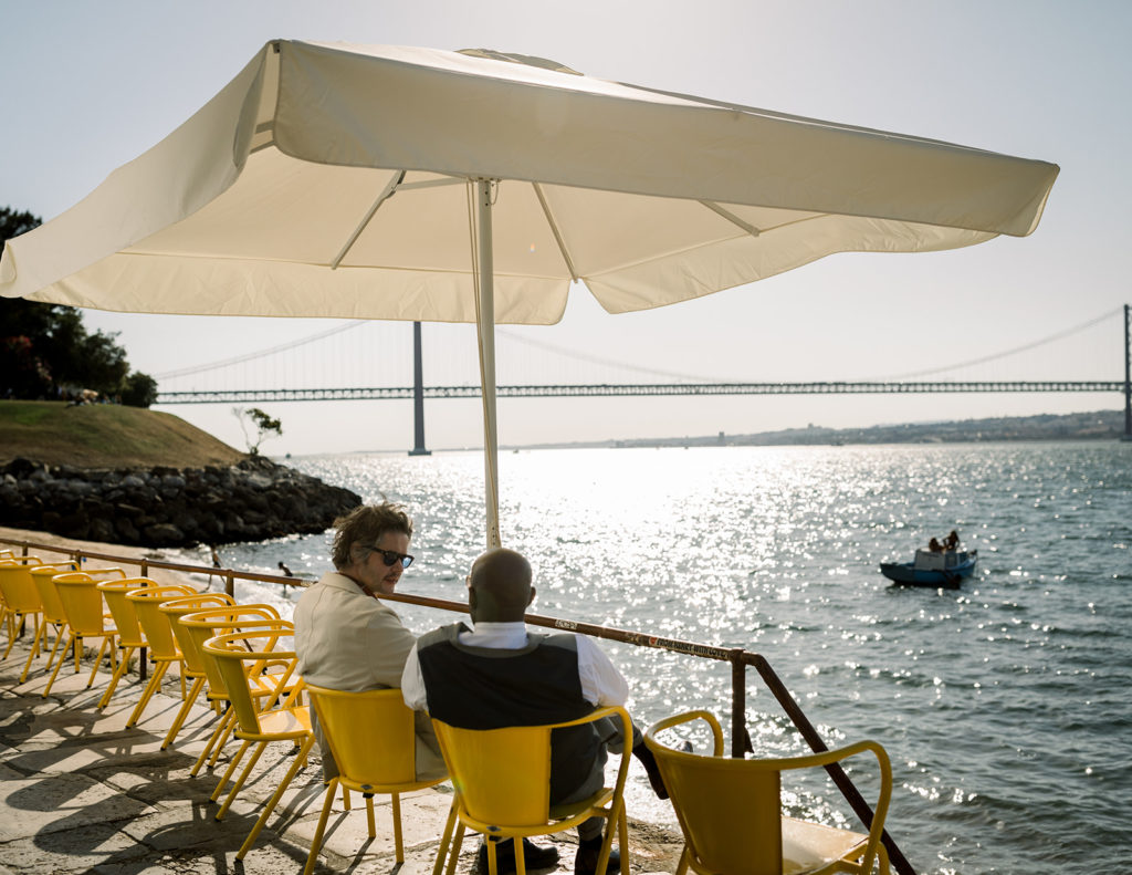 Wedding guests enjoying the Lisbon riverside views