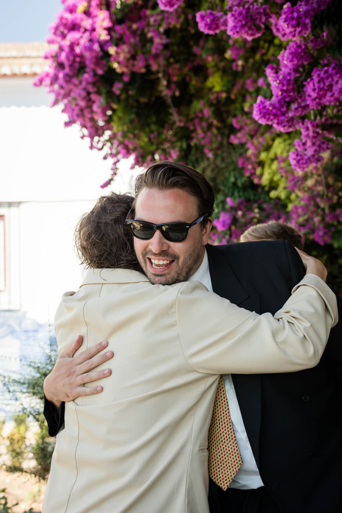 Groom greeting the guests at his Lisbon wedding