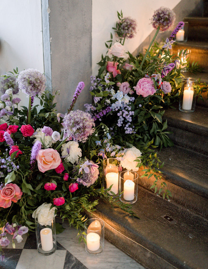 Floral decoration with candles on the stairs